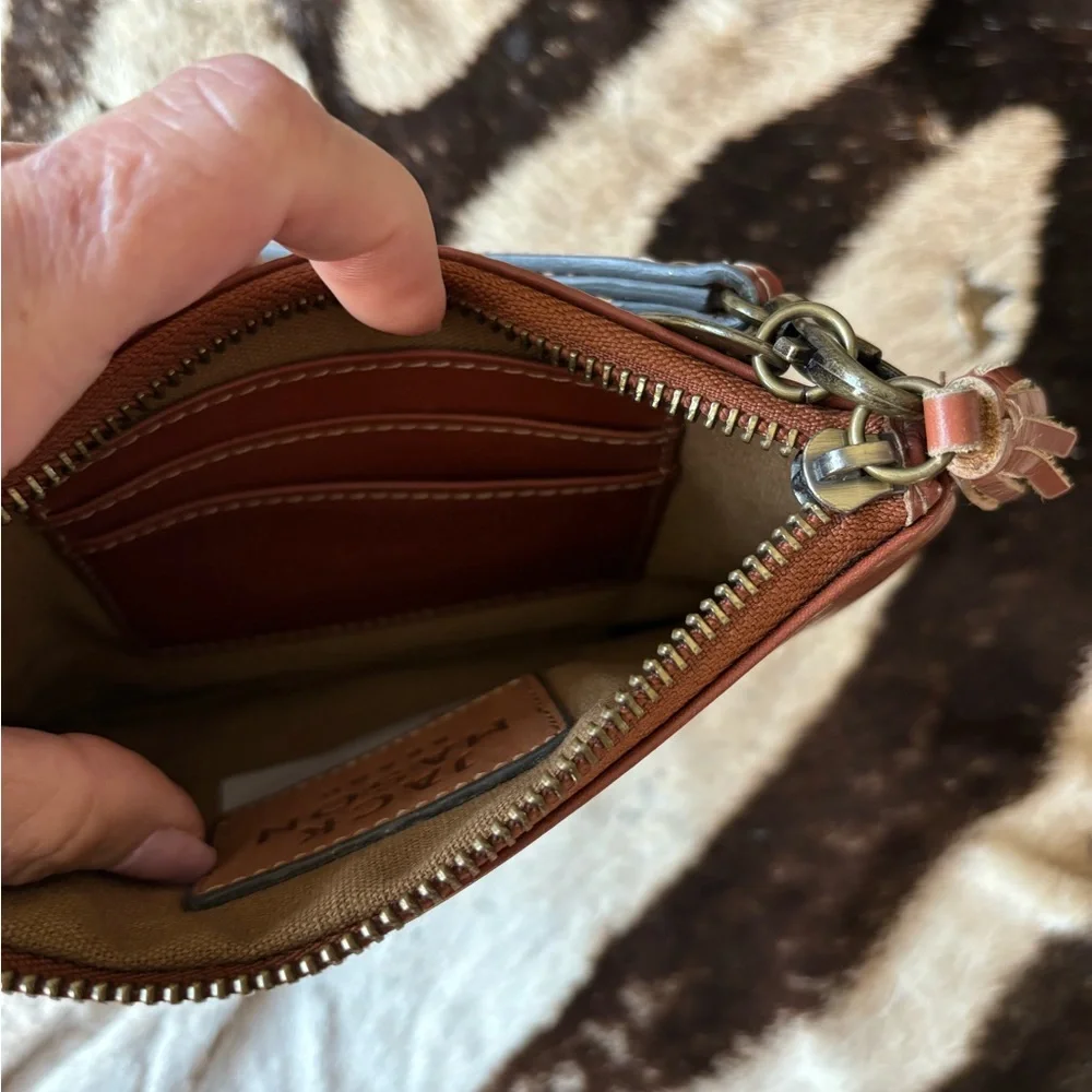 Jack Mason brand leather wristlet. Great‎ condition Texas Tech emblem removable.